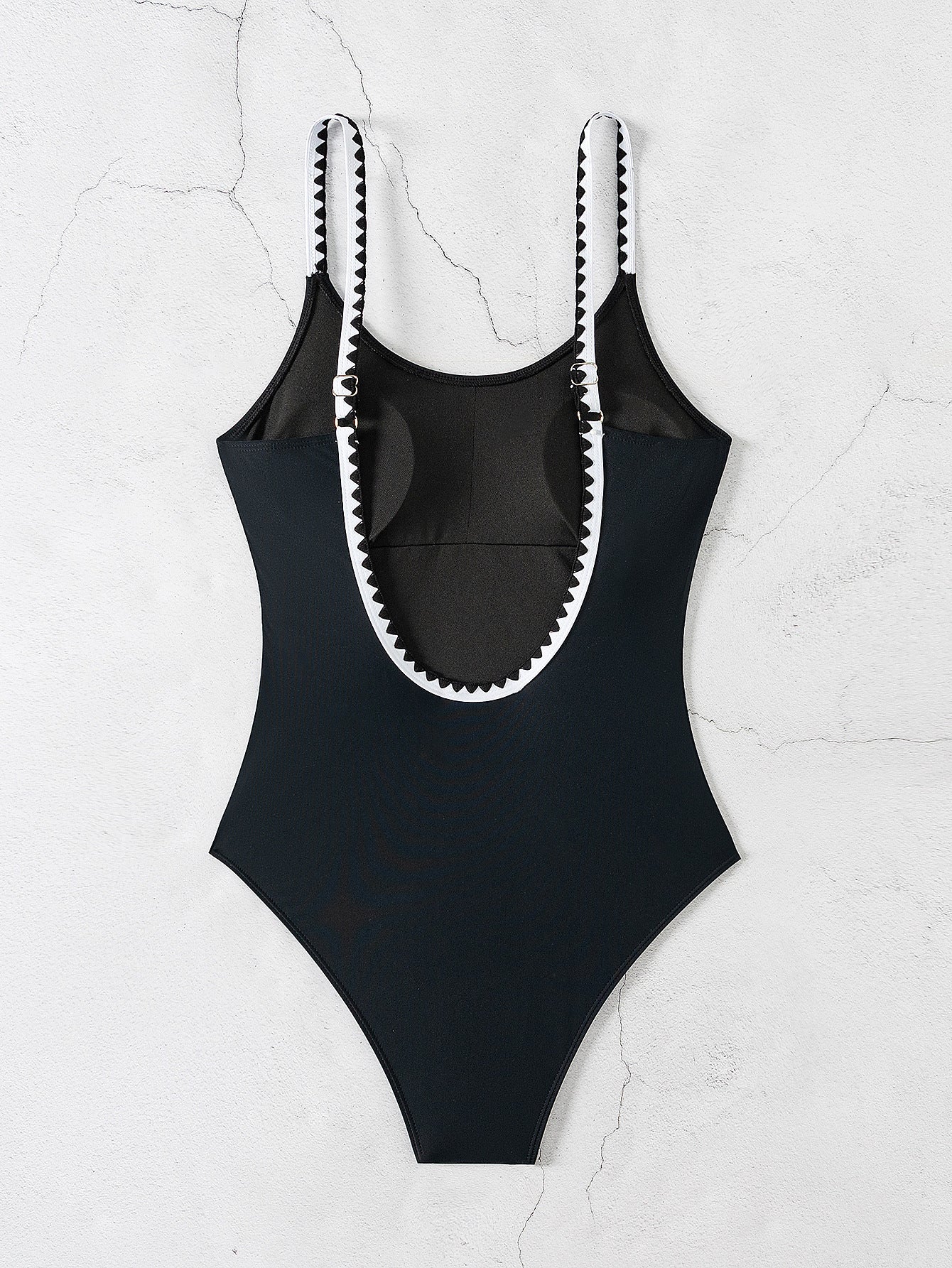 2025 Back view of black one-piece swimsuit deep scoop back